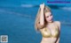 Atittaya Chaiyasing beauty poses hot on the beach with a yellow bikini (41 photos) P22 No.da8dd6
