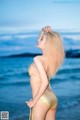 Atittaya Chaiyasing beauty poses hot on the beach with a yellow bikini (41 photos) P7 No.9a8197